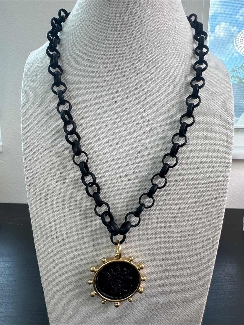 Black Chain Necklace with Gold Sunburst Pendant